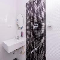 Двухместный (Стандартный двухместный номер с 1 кроватью или 2 отдельными кроватями) отеля Treebo Greenwood Premier Suites, Бангалор