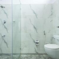 Двухместный (Двухместный номер Делюкс с 1 кроватью или 2 отдельными кроватями) отеля Treebo Greenwood Premier Suites, Бангалор