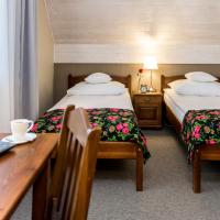 Двухместный (Двухместный номер «Премиум» с 2 отдельными кроватями) отеля Rezydencja Sienkiewiczówka, Закопане