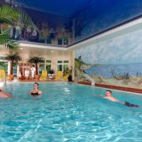 Номер (Шале (для 6 человек)) парк-отеля Ferienpark Heidenholz, Шверин