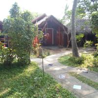 Трехместный (Трехместный номер, вид на сад) гостевого дома Inn On The Bay, Пасикуда