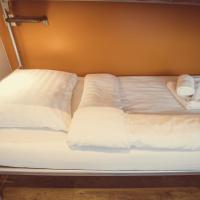 Одноместный (Одноместный номер с основными удобствами и общей ванной комнатой) отеля Budget Hotel Tourist Inn, Амстердам