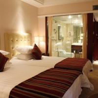 Двухместный (Двухместный номер Делюкс с 2 отдельными кроватями) отеля New Century Hotel Ningbo, Нинбо