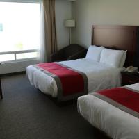 Двухместный (Двухместный номер "Премиум" с 2 двуспальными кроватями) отеля Radisson Poliforum Plaza Hotel Leon, Леон (Штат Гуанахуато)