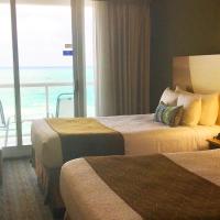 Четырехместный (Номер с 2 двуспальными кроватями и видом на океан) курортного отеля Best Western Plus Atlantic Beach Resort, Майами-Бич