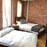 Апартаменты (Номер-студио Делюкс с кроватью размера «queen-size» и матрасом-футоном) апарт-отеля The Nomad Suites, Нью-Йорк