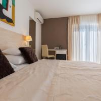 Двухместный (Улучшенный двухместный номер с 1 кроватью и балконом) отеля Villa Liburnum, Задар