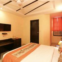 Двухместный (Бюджетный двухместный номер с 1 кроватью или 2 отдельными кроватями) отеля Hotel Unistar, Нью-Дели